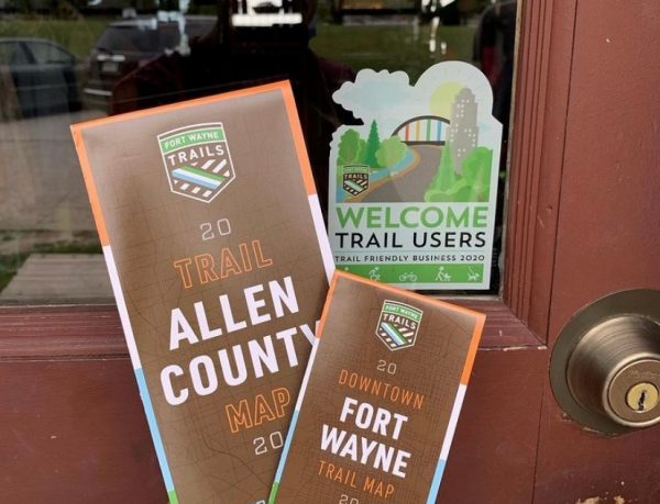 welcome trail uses window sticker and trail maps at a trail friendly business